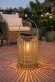 AI Studio Photo - Standing facing the camera, natural confident posture, arms relaxed at sides, front view, full body visible. CAMERA SHOT: A medium shot focusing on the lantern, showcasing its texture and the light it emits, with a slightly blurred background to emphasize the product. [Full body]