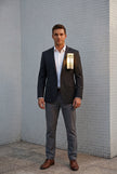 AI Studio Photo - Standing facing the camera, natural confident posture, arms relaxed at sides, front view, full body visible. CAMERA SHOT: Medium shot focusing on the wall lamp, showcasing its design and how it mounts to the wall. [Full body]