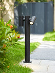 AI Studio Photo - Standing facing the camera, natural confident posture, arms relaxed at sides, front view, full body visible. CAMERA SHOT: Medium shot focusing on the garden light, with a shallow depth of field to blur the background and highlight the product. [Full body]